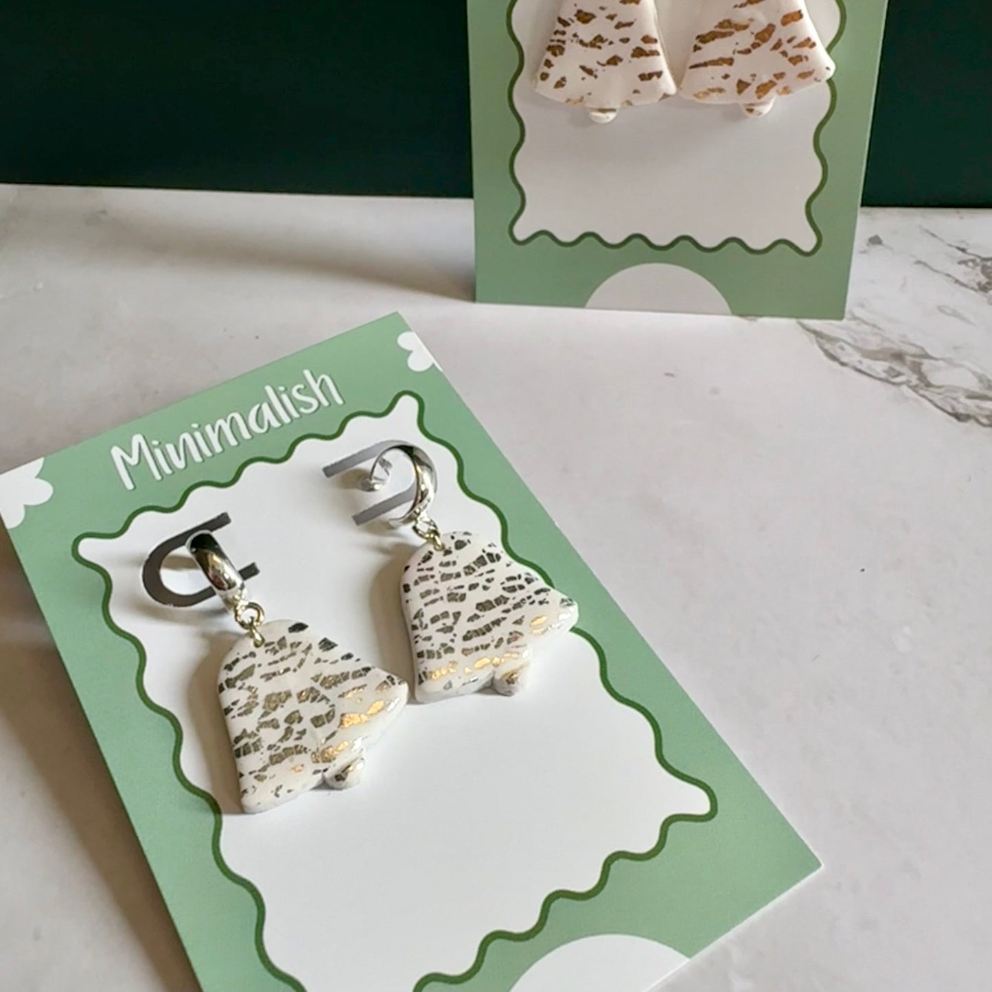 Metallic bell half hoops