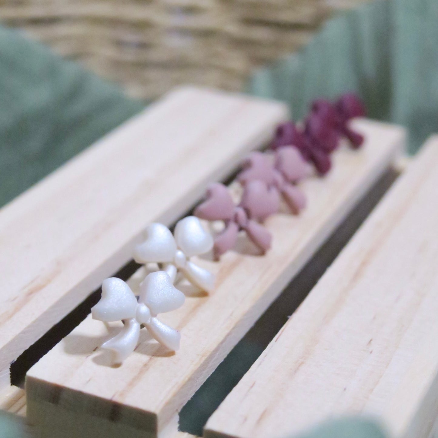 Dainty bow studs